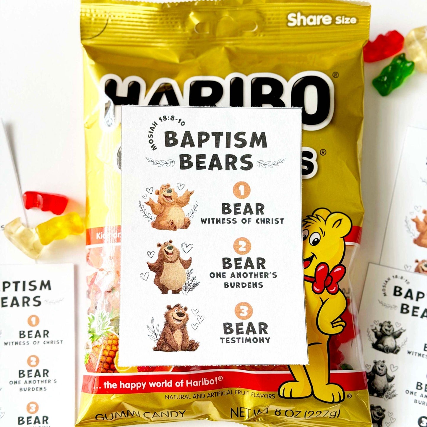 Close-up of Baptism Bears printable tag on gummy bear candy bag, LDS baptism favor for kids featuring baptism covenants and testimony
